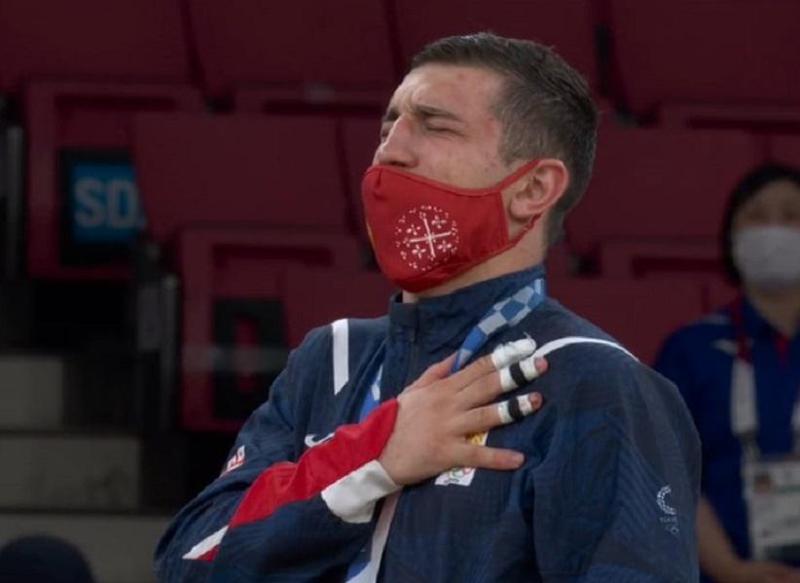 ტოკიოში აჟღერებული საქართველოს სახელმწიფო ჰიმნი და ოლიმპიური ჩემპიონის, ლაშა ბექაურის ემოციები (ვიდეო)