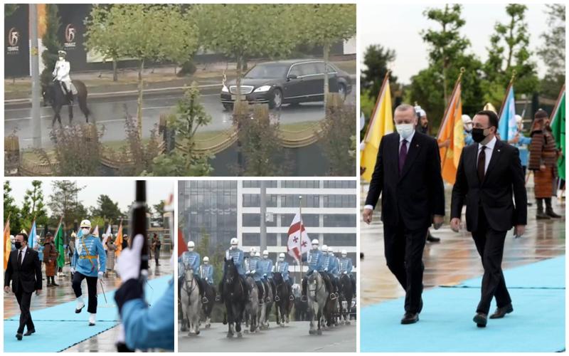 მხედრები, ლიმუზინი, ორკესტრი - თურქეთში ღარიბაშვილის დახვედრის პომპეზური ცერემონიის ამსახველი კადრები