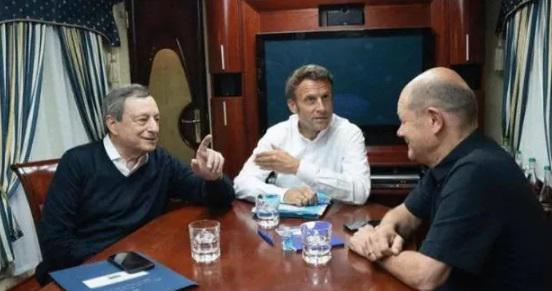 დღის ფოტო: ემანუელ მაკრონი, ოლაფ შოლცი და მარიო დრაგი მატარებელში - გზად უკრაინისკენ