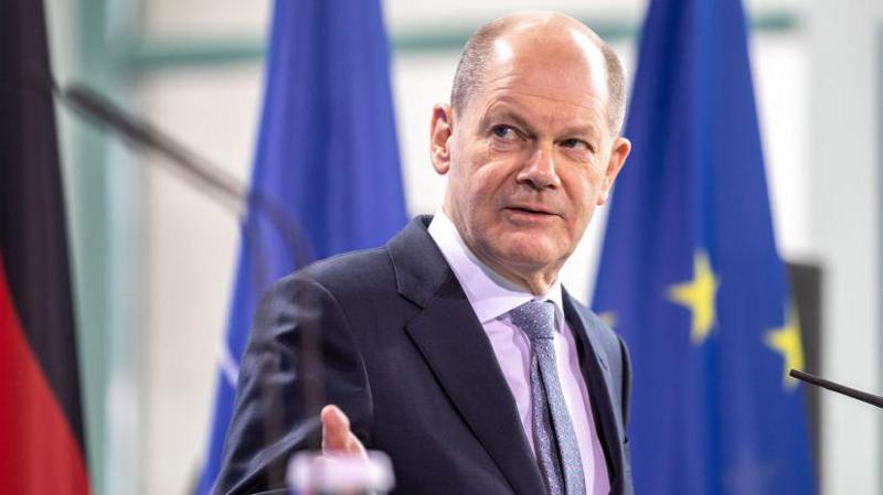 რას ამბობს ოლაფ შოლცი ზელიმხან ხანგოშვილის მკვლელობისთვის ბრალდებულის გათავისუფლებაზე - "არავისთვის არ იყო მარტივი გადაწყვეტილების მიღება"