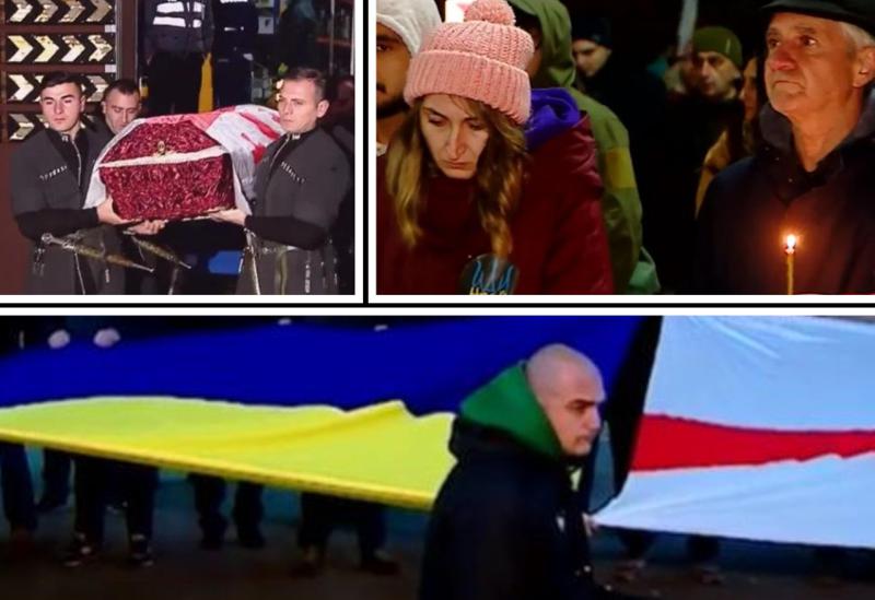 კადრები აეროპორტიდან - უკრაინაში დაღუპული ქართველი მებრძოლი ჯაბა ხოფერია სამშობლოში ჩამოასვენეს