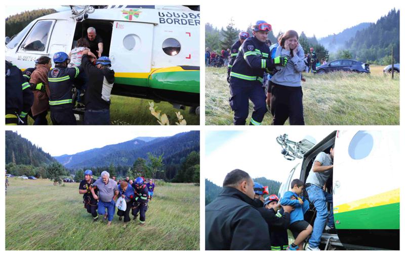 უახლესი ფოტოები სტიქიის ზონიდან: როგორ გამოჰყავთ მაშველებს გადარჩენილი მოქალაქეები - მათ შორის არიან ბავშვები