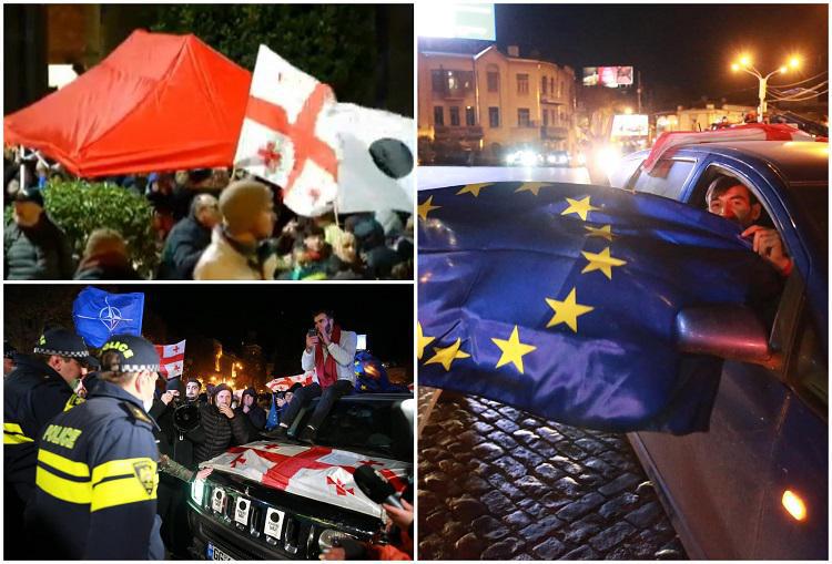წითელი კარვები რუსთაველზე, ღამის გასათევად მოწყობილი ინფრასტრუქტურა და სიტყვით გამოსვლის მოლოდინი - რა ხდება პარლამენტთან, სადაც პოლიციის წინააღმდეგობის მიუხედავად, მანქანებმა შესვლა მაინც შეძლეს (ფოტო/ვიდეო)